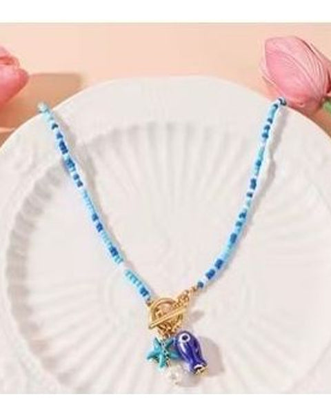 Bohemian Blue Seed Bead Necklace Fish and Starfish Charms Toggle Clasp